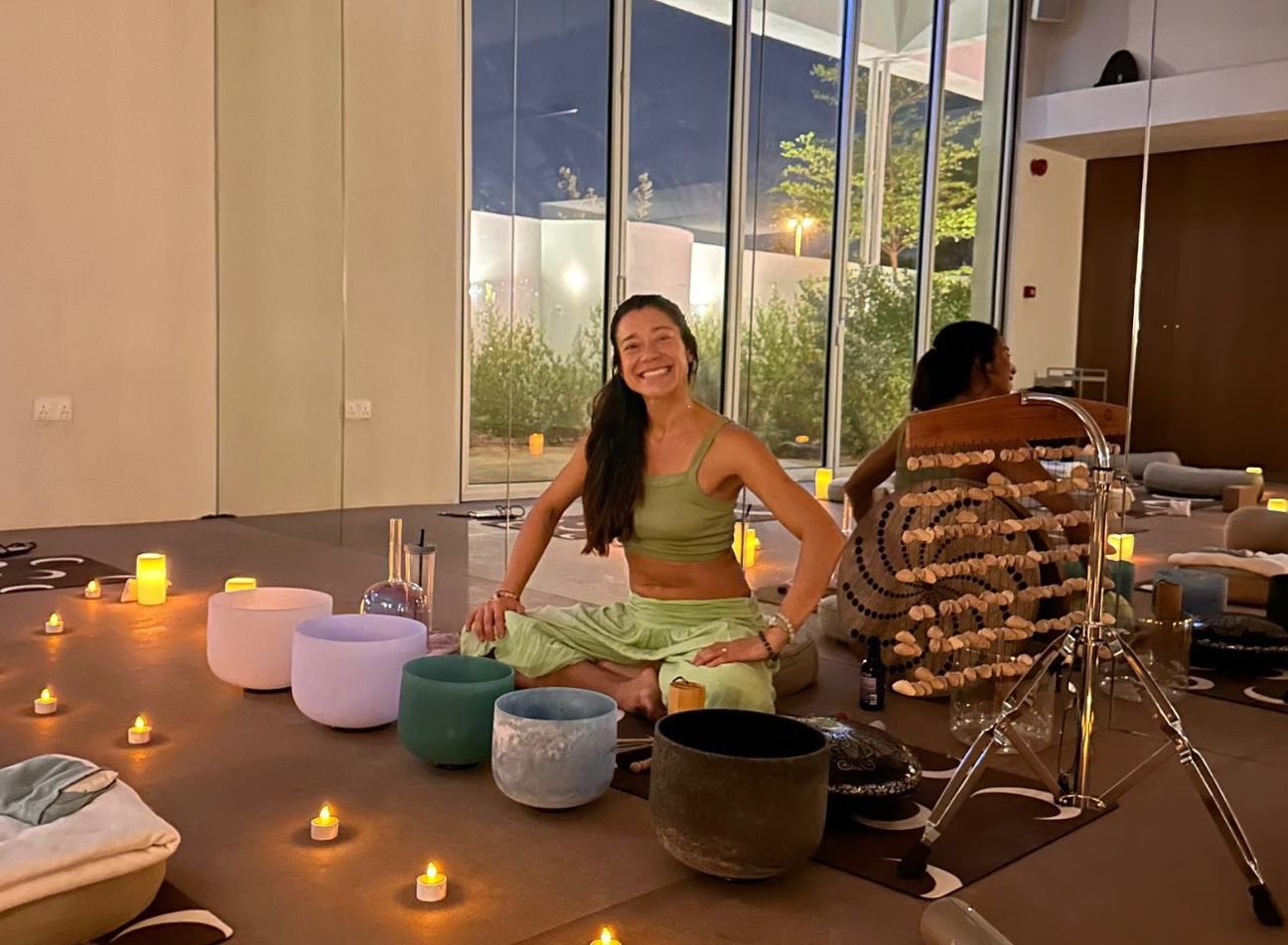 Emma from Yoga & Wellness with Emma with her sound-healing instruments